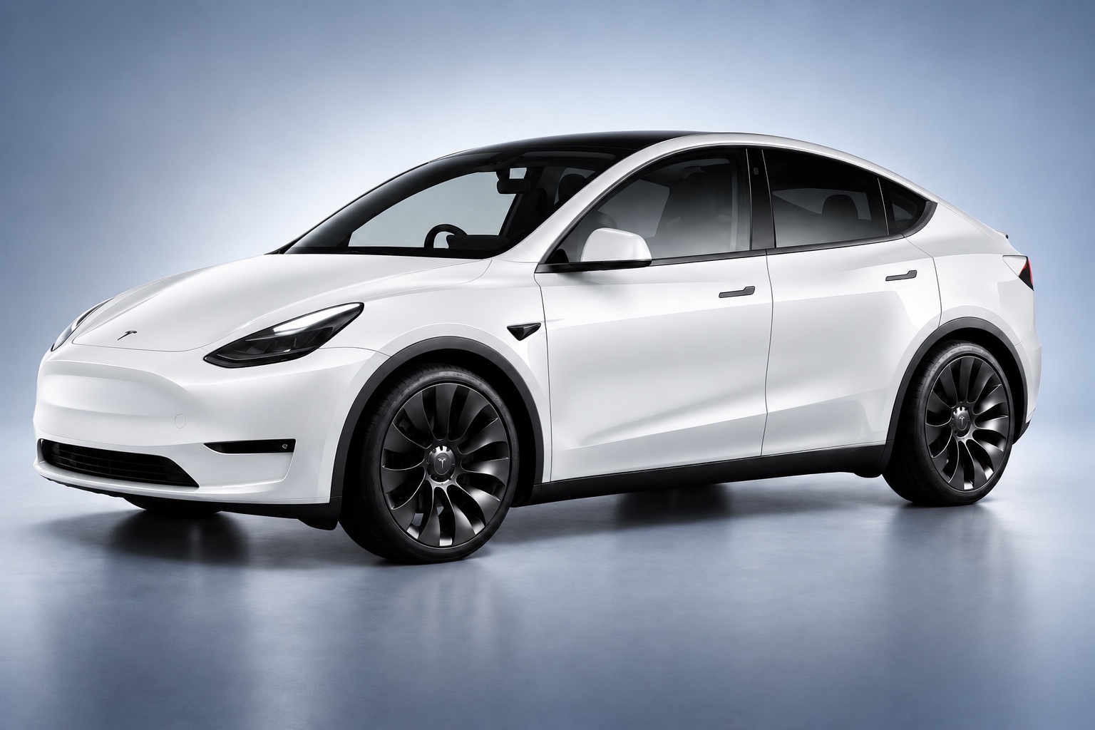 White Tesla Model Y in a premium studio setting